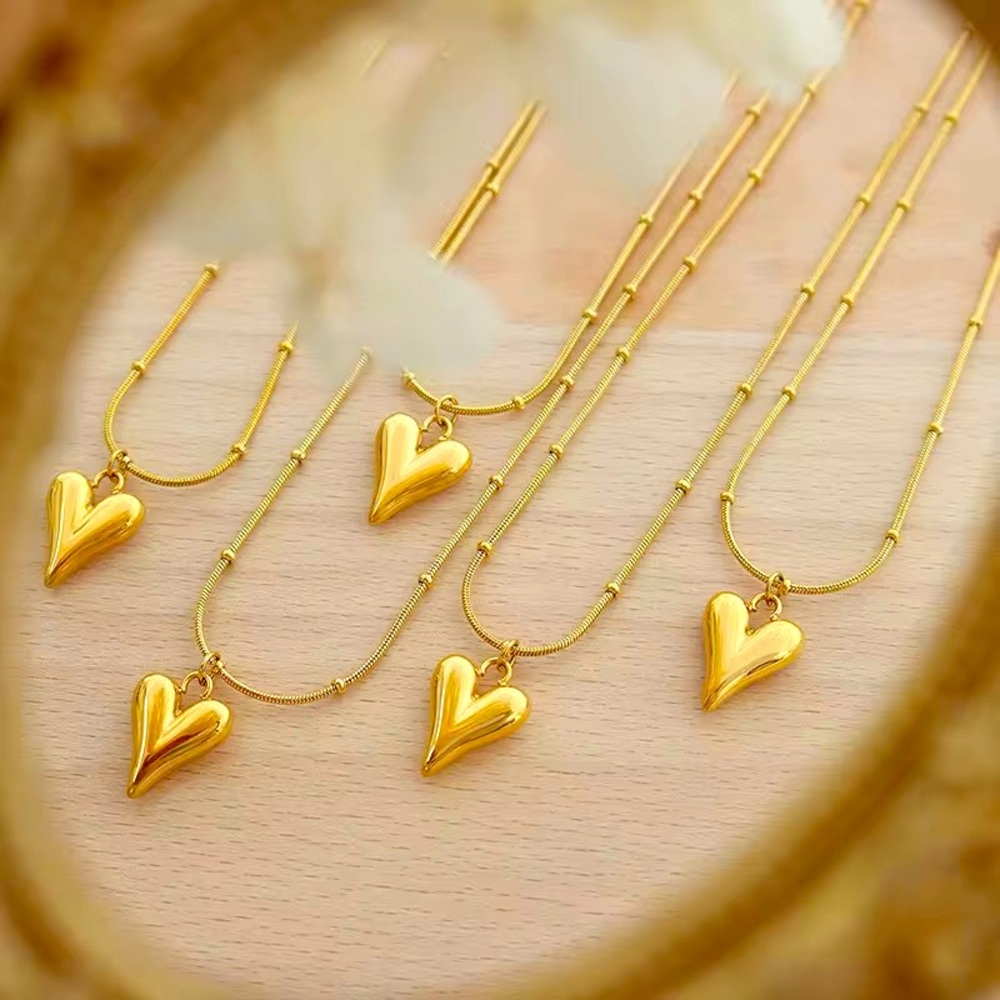 18k gold stainless steel heart long pendant.